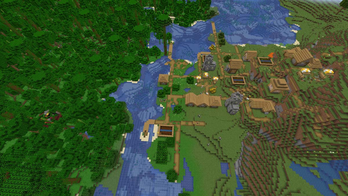 Minecraft village with an exposed ruined portal