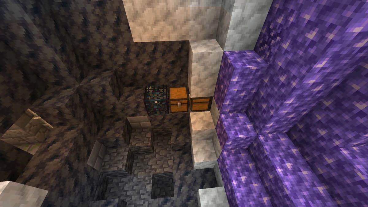 Chests and spawner inside amethyst geode in Minecraft