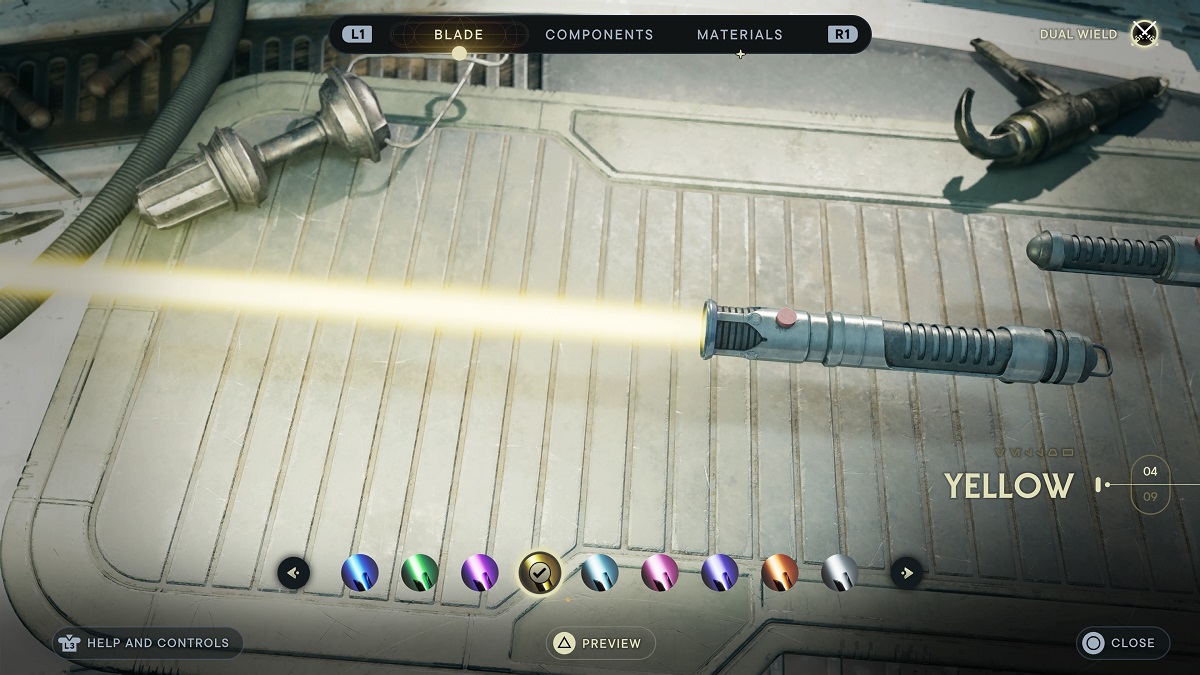 Lightsaber with yellow blade ignited on Workbench in Star Wars Jedi: Survivor. 