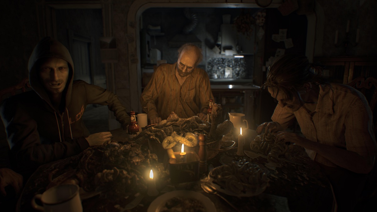 Ethan at a table with the Baker family