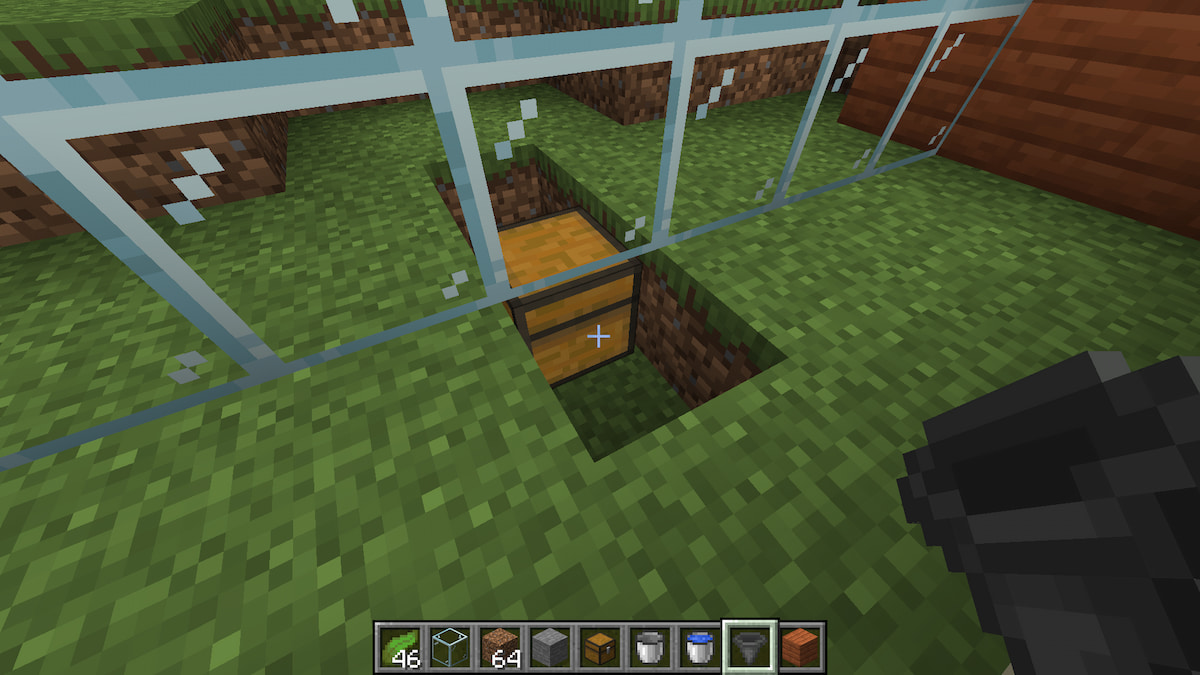 A chest positioned underneath the kelp farm.