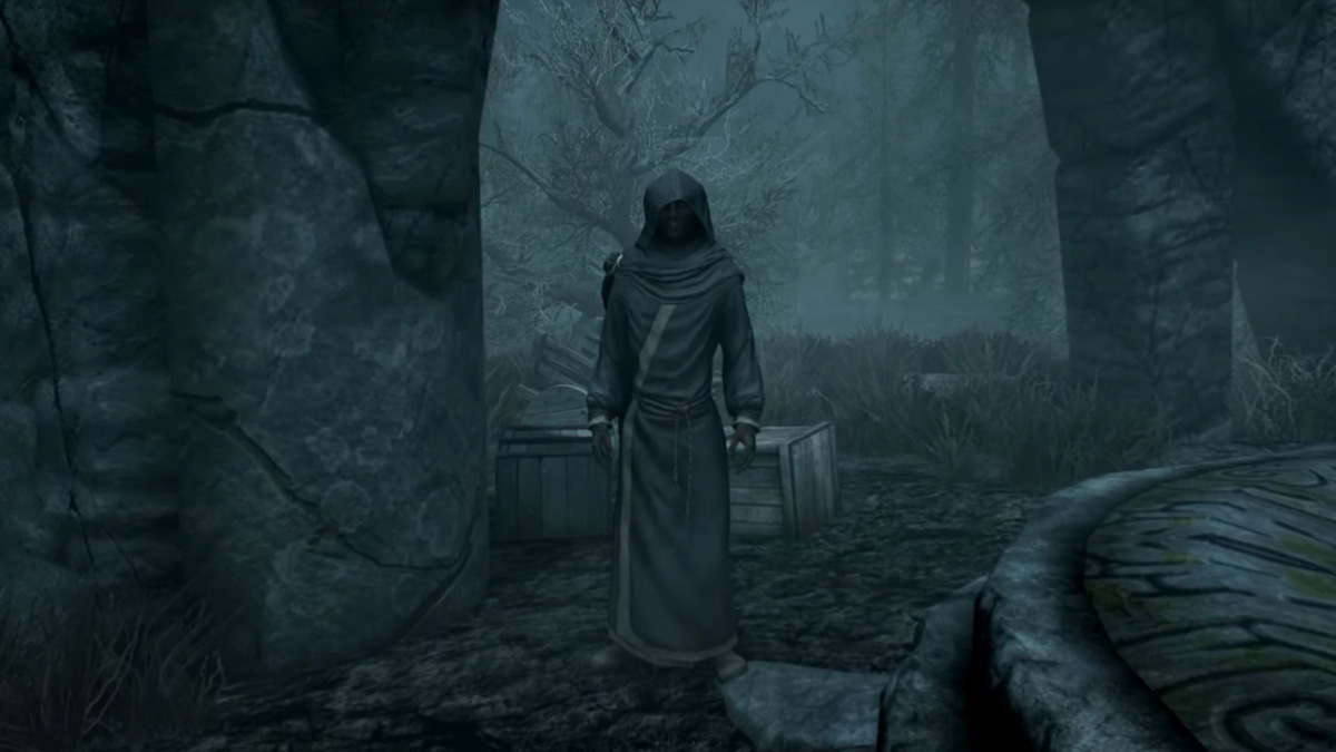 a dark robed figure standing by pillars and ruins during nighttime