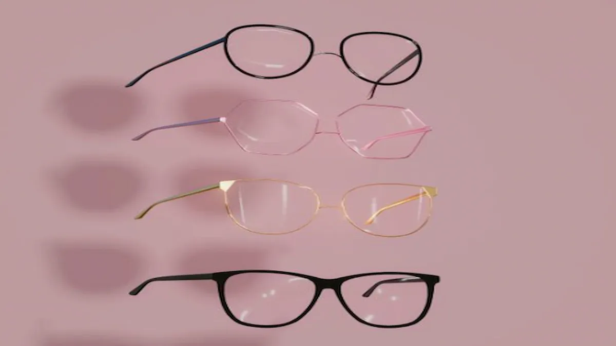 Four different types of glasses on a pink background