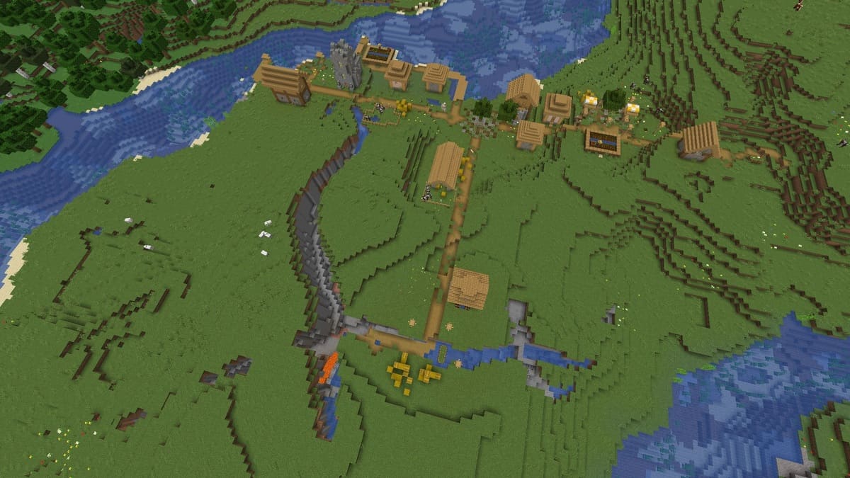 Ravine with lava and village in Minecraft