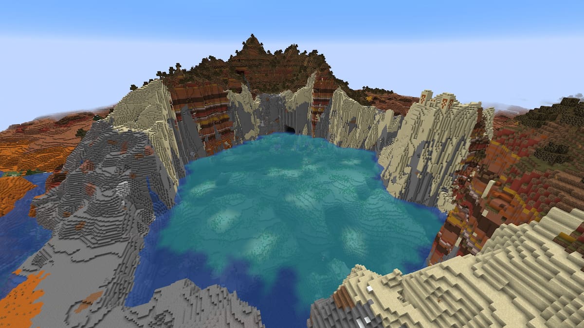 A blue lake in the middle of a Minecraft Badlands biome